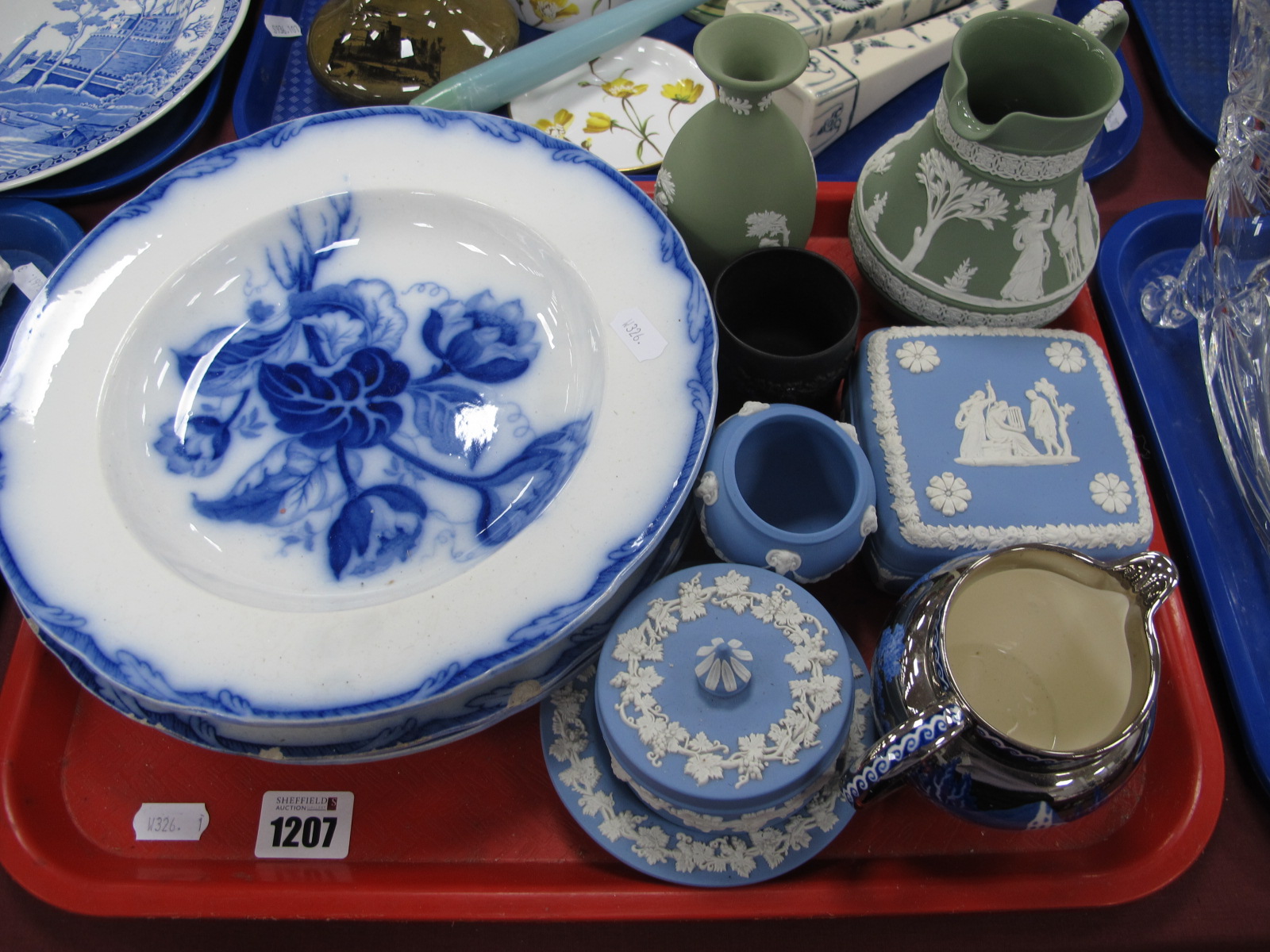 Wedgwood Jasper Ware Trinkets, three 'Nymphaea' plates, Fallow Deer jug.