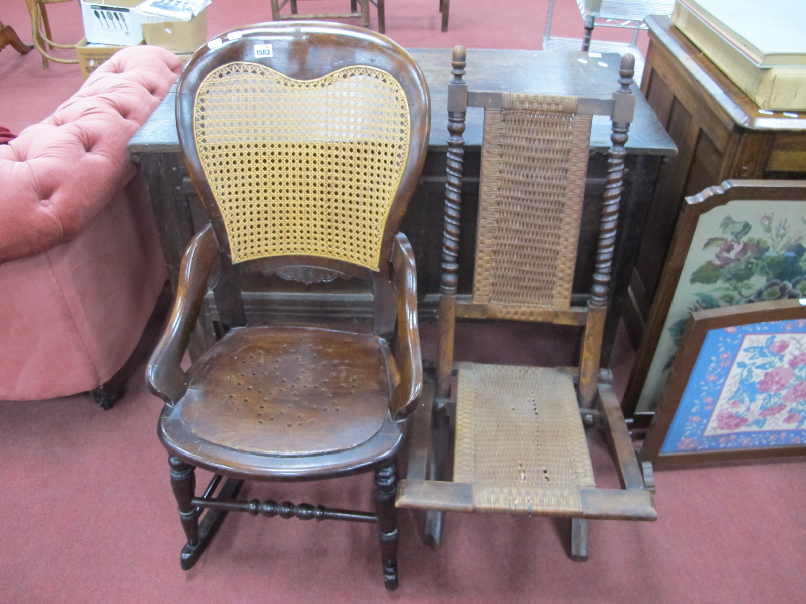 A XIX Century Ash Rocking Chair with a cained back, shaped arms, on turned supports with rockers,
