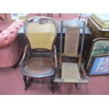 A XIX Century Ash Rocking Chair with a cained back, shaped arms, on turned supports with rockers,