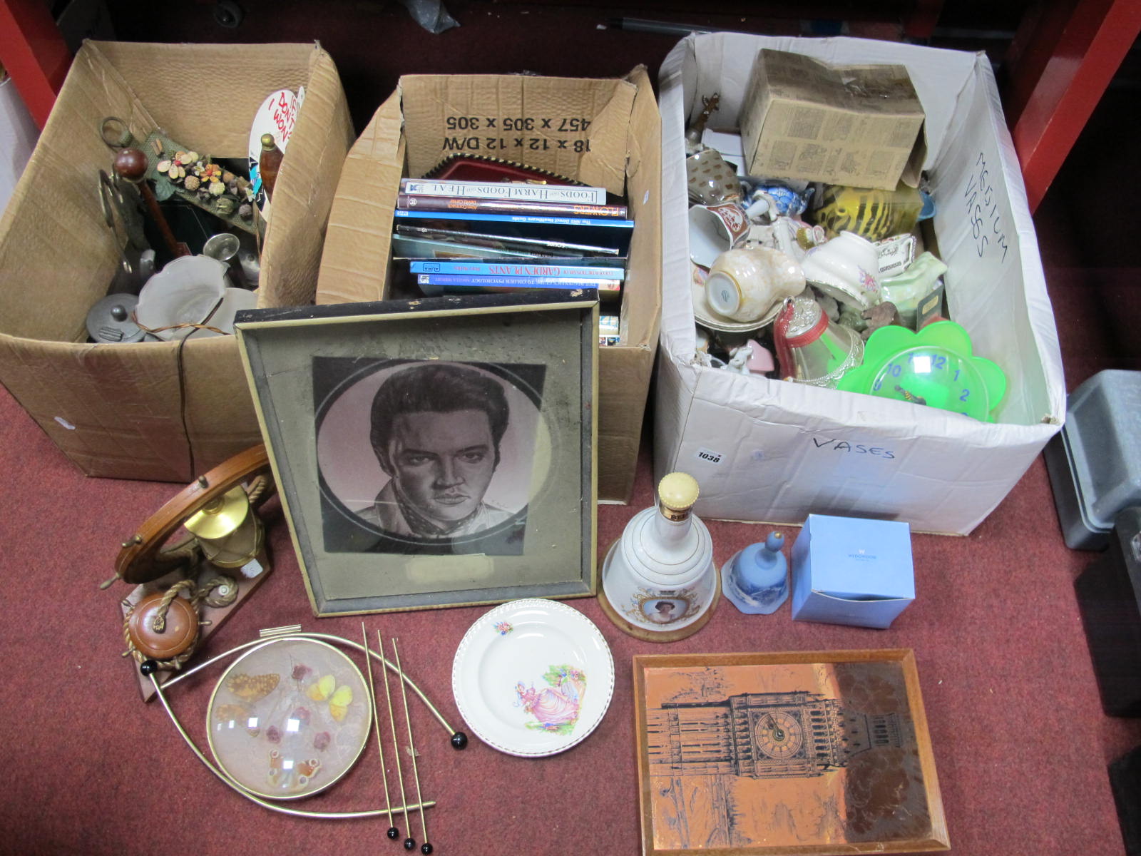 Books, ships wheel lamp, pewter ware, Elvis print, pottery, etc:- Three Boxes.