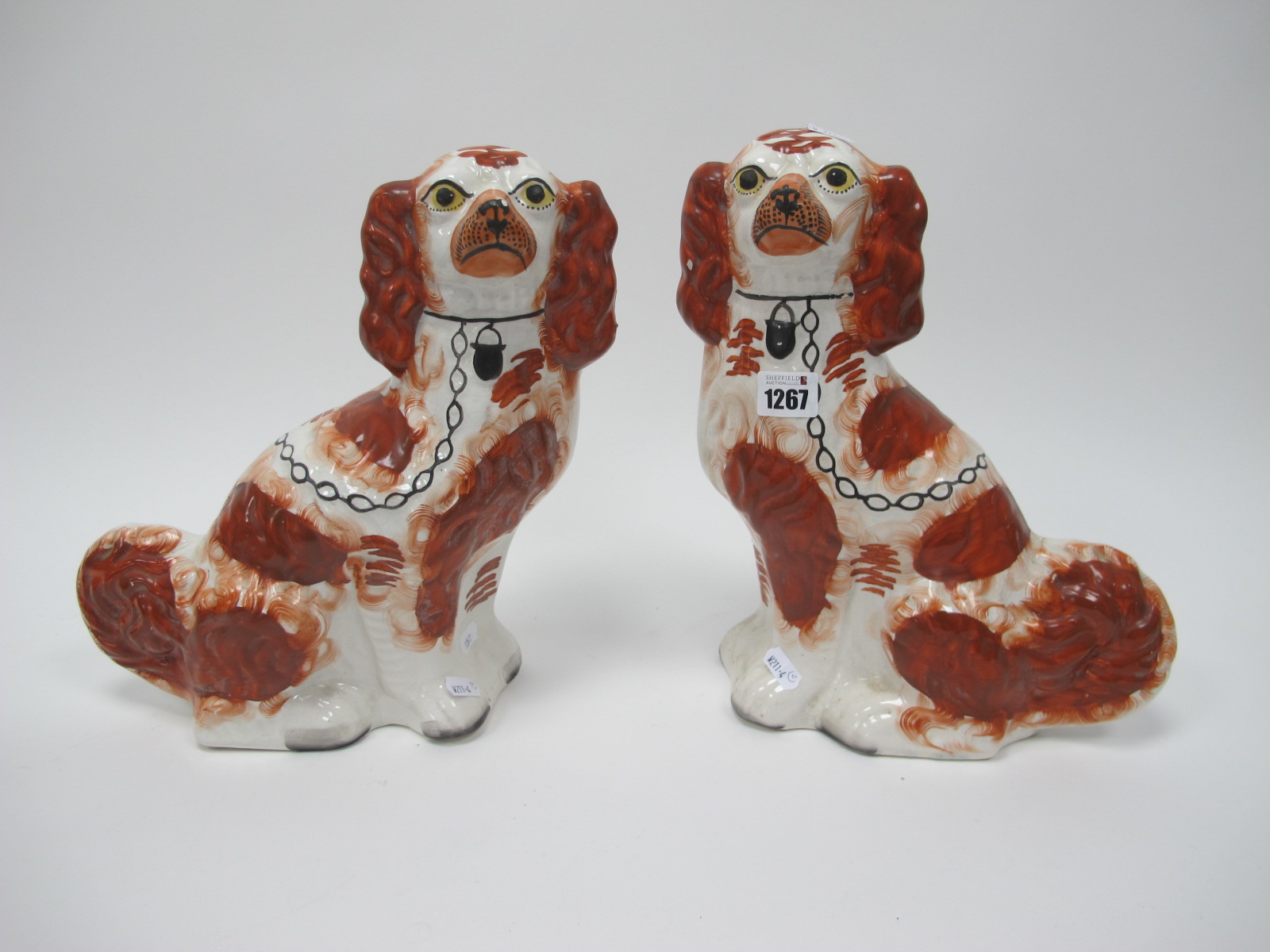 A Pair of XIX Century Staffordshire Dogs, 32cm high.
