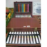 Artists Paints, easel, pencils, pens, crayons, etc, in two cases.
