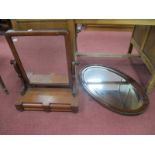 A XIX Century Mahogany Dressing Table Mirror, with two small drawers, together with an oval mahogany