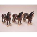 One Brown Beswick Shire Horse, 21cm high with two unmarked shire horses.