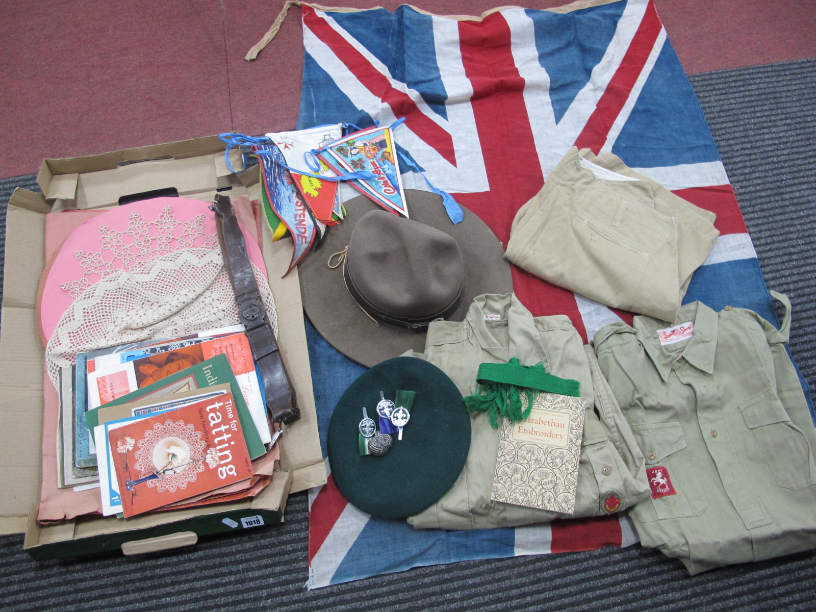 Boy Scouts Belt, beret, Stetson hat, uniform, Union Jack, badges, etc, embroidery items:- One Box.