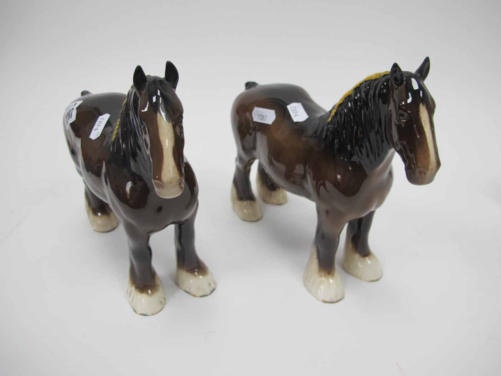 Two Brown Beswick Shire Horses, both marked, 21cm high.