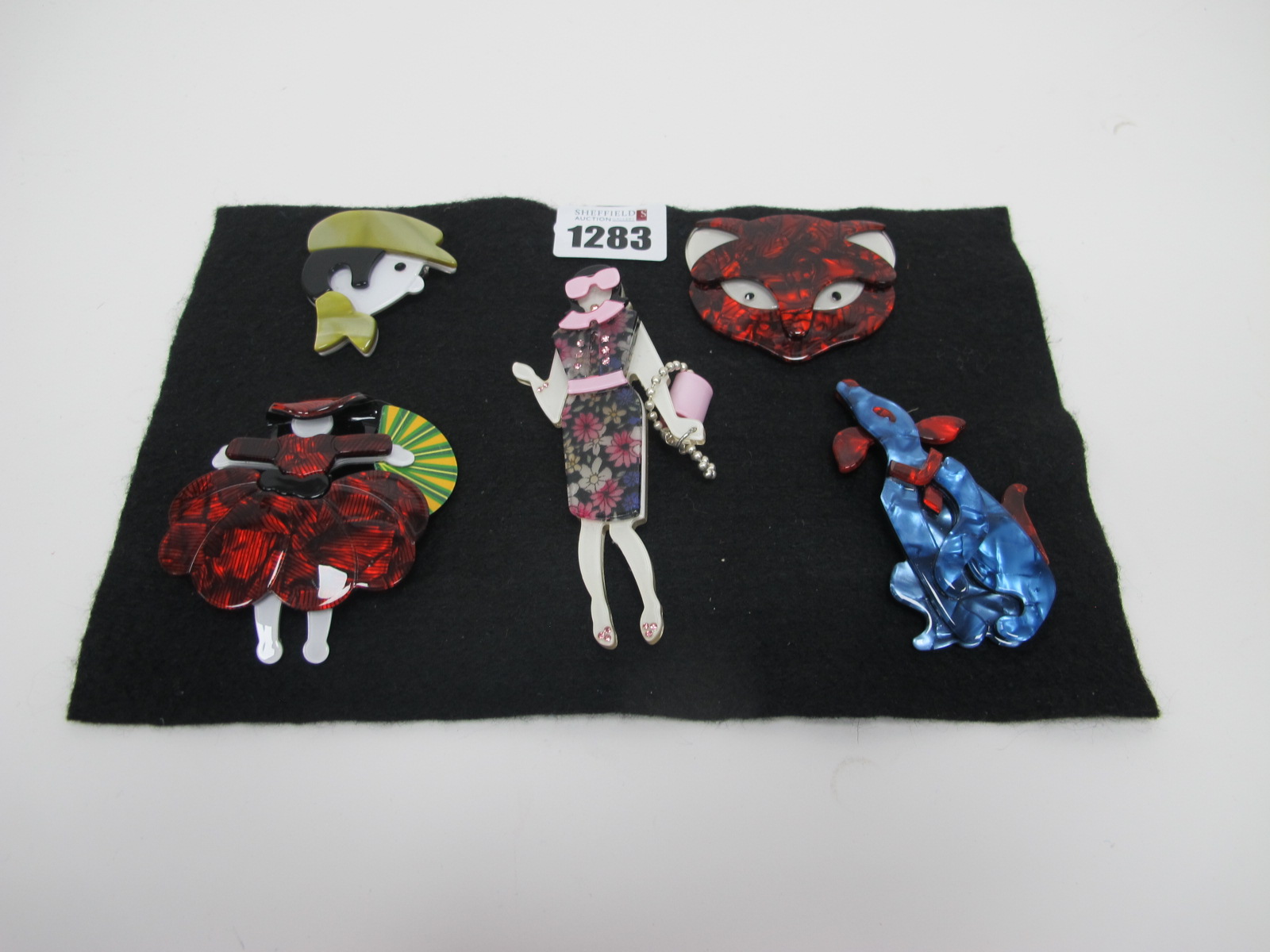 Five Modern Brooches.