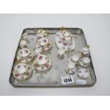 A Miniature Hammersley China Tea Service, tea pot coffee, cream jug etc, with floral decoration.