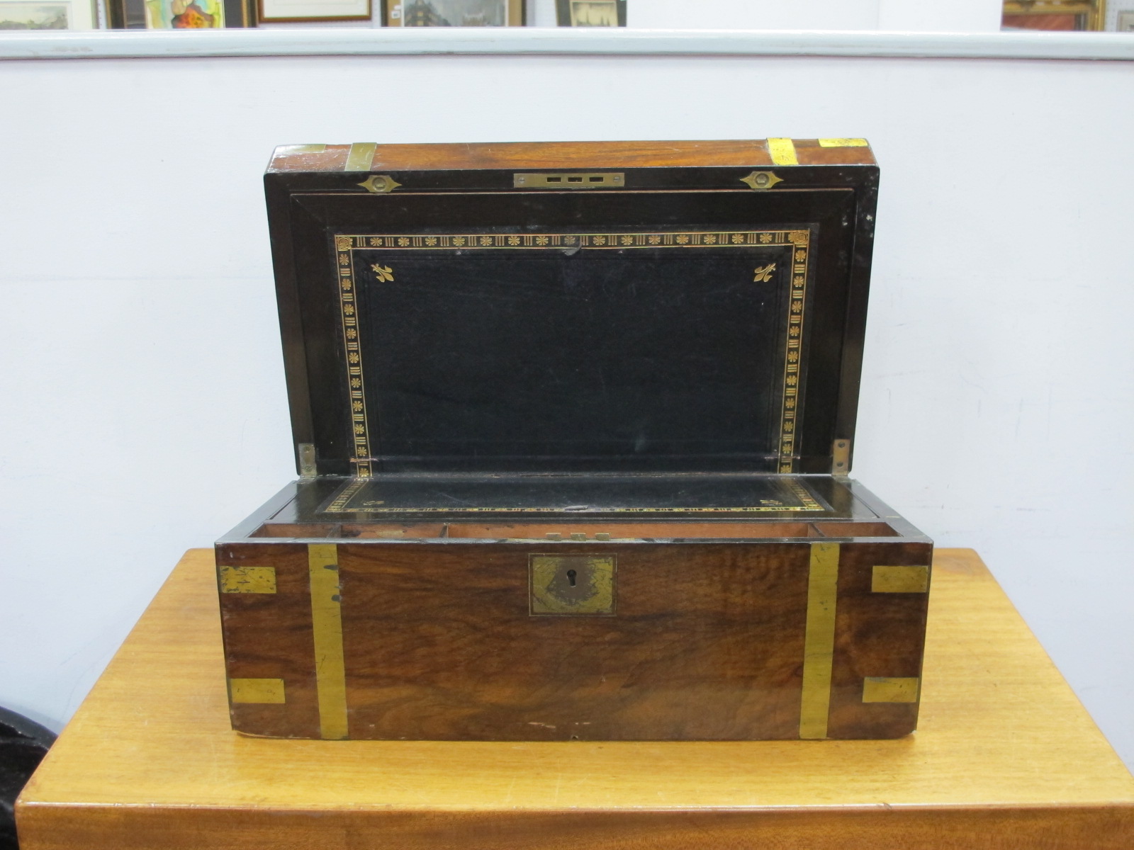 A XIX Century Walnut Brass Bound Writing Slope, with black sciver.