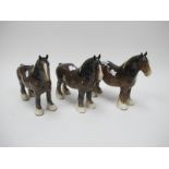 Three Brown Beswick Shire Horses, all marked, 21cm high.