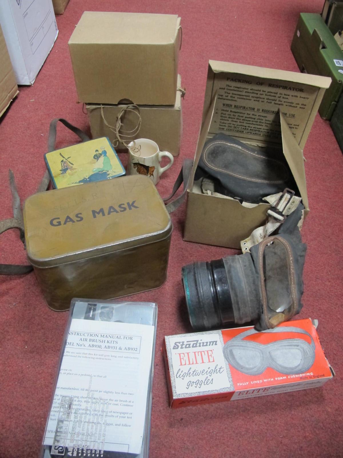 Gas Masks, stadium goggles,tin, castors, air brush kit, etc:- One Box.