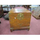 A Chinese Elm Box, with brass lock plate, brass mounts, carrying handles, on bracket feet, 44cm wide