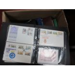 An Accumulation of G.B, Isle of Man, Channel Islands FDC's, in three albums, plus some loose, over
