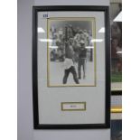 Pele Autograph. black pen signed (unverified) on a black and white photograph of him, as a montage.