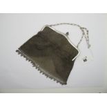 A Vintage Mesh Link Evening Bag, the shaped frame with high cabochon inset clasp (frame 16.4cm
