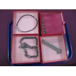 A Butler & Wilson Heart and Bow Necklace, boxed, together with two further Butler & Wilson necklaces