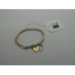 A 9ct Gold Gate Style Bracelet, of open work design, to heart shape padlock clasp, (10 grams).