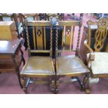A pair of 1920's Oak Dinning Chairs, with barley twist supports, drop in seats, on cup cover