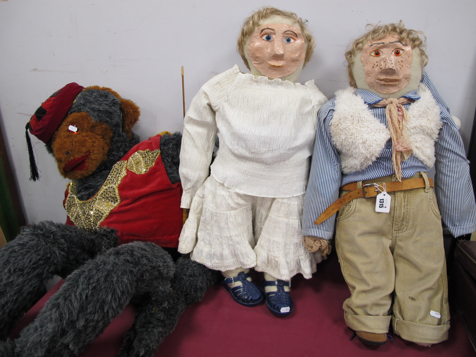 Papier Mache Faced Puppets, with soft bodies of lady and gentleman 74cm high, a large monkey. (3)