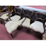 A Set of Four XIX Century Rosewood Salon Chairs, with shaped backs, upholsted seats, on turned