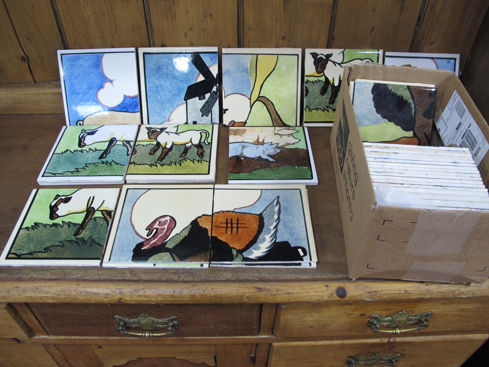 Farmyard Tiles by Carter of Poole, originally designed E.E Stickland (twelve sets of only thee tiles