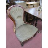 XIX Century Mahogany Nursing Chair, with a hooped back, upholstered back and seat, on turned