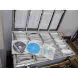 An Aluminium Case Containing CDs, Seal, Lynard Skinnard,, Happy Mondays, etc.