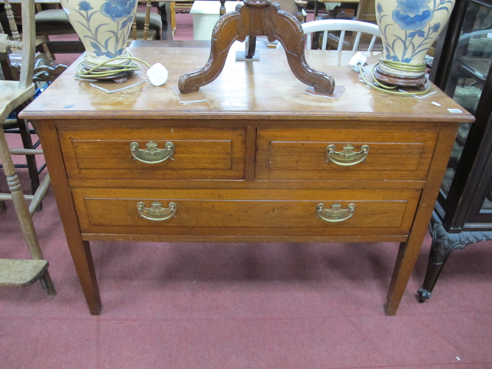 An Early XX Century Walnut Side Table, with two short and one long drawer on square legs.
