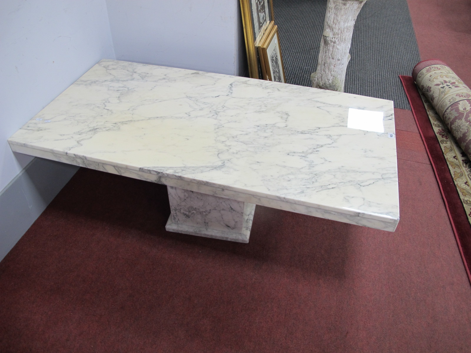 Marble Coffee table, of rectangular form, the top 141 x 70cm, on block base.