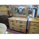 An Early XX Century Satin Walnut Dressing Table, with two side mirrors, central mirror, two short