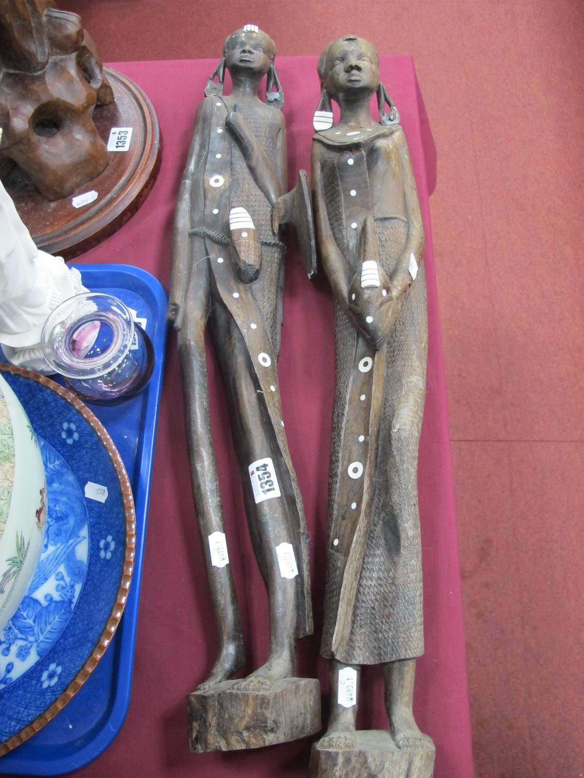 A Near Pair of African Hardwood Figures, in traditional style, 65cm high.