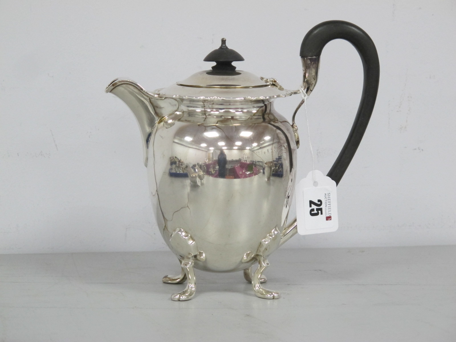 A Walker & Hall Hallmarked Silver Hot Water Jug, of ovoid form, with pie crust rim, black wooden