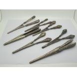 Seven Hallmarked Silver Handles Glove Stretchers, with engraved and embossed decoration.