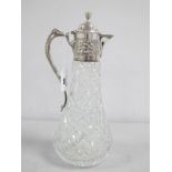 A Roberts & Belk Hallmarked Silver Mounted Claret Jug, with cut glass body, decorated with emblems