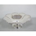 A Hallmarked Silver Dish, of circular petal shaped form, raised on short circular base, H.A.