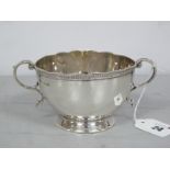 A Hallmarked Silver Twin Handled Sugar Bowl, with wavy edge, 10½ cm diameter (160 grams).