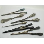 A Hallmarked Silver Handled Shoe Horn and Button Hook, with plain bulbous handles, an ebony and