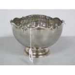 A Chester Hallmarked Silver Posy Bowl, (maker and date mark rubbed), on circular spreading base, rim
