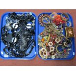 A Selection of Modern Costume Jewellery, including ornate bead necklaces, bangles, etc:- Two Trays.