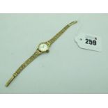 Rone: A 9ct Gold Ladies Wristwatch, the signed dial with line markers, in plain case, to bark effect