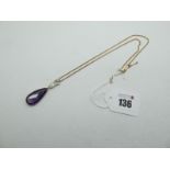 A c. Early XX Century Large Teardrop Amethyst Single Stone Pendant, elongated collet set below