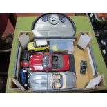 A Corgi Mini Display Plinth. depicting a Mini dashboard, with model MIni's, Maisto Mercedes SLK,