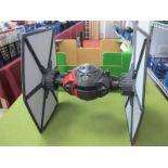 A Star Wars Special Forces Tie Fighter, black series, unboxed.