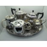 A Modernist Style Kent Plate Four Piece Tea Set, together with another plated four piece tea set and
