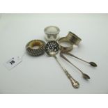 Three Hallmarked Silver Napkin Rings, a hallmarked silver sifter spoon, a pair of sugar tongs etc.