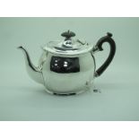 A Scottish Hallmarked Silver Teapot, Hamilton & Inches, Edinburgh 1906, of plain oval form with