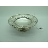 A Decorative Hallmarked Silver Footed Dish, London 1924, with wide scroll pierced rim, raised on