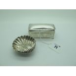 A Hallmarked Silver Lidded Glass Trinket Box, (dents), 9cm long; Together with A Shell Dish. (2)