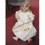 An Early XX Century Bisque Headed Doll by Handwerck (Germany), composition jointed body, brown eyes,