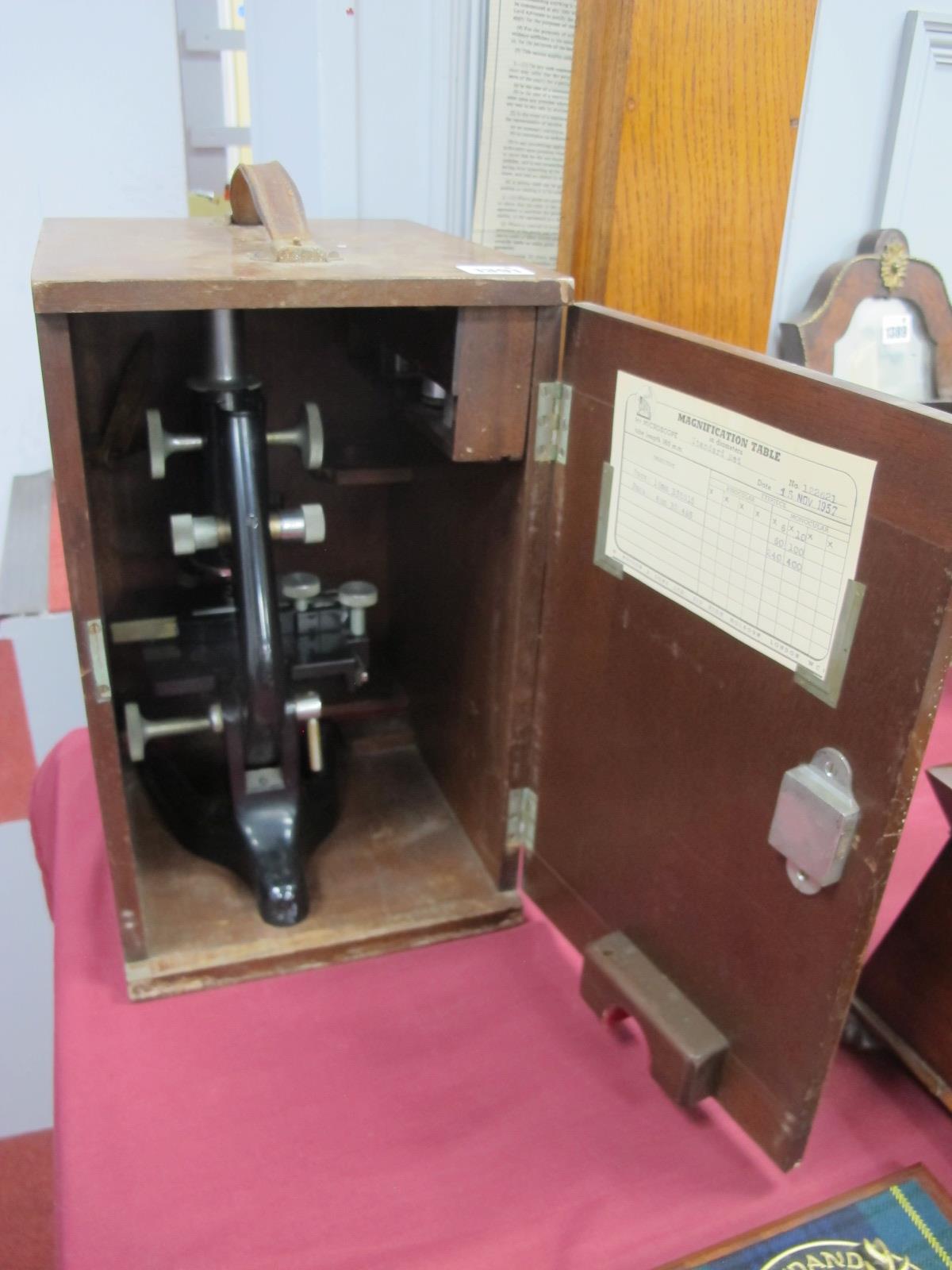 A Xx Century Watsons & Sons Ltd, 313 Holborn, London, Microscope, in a mahogany case.